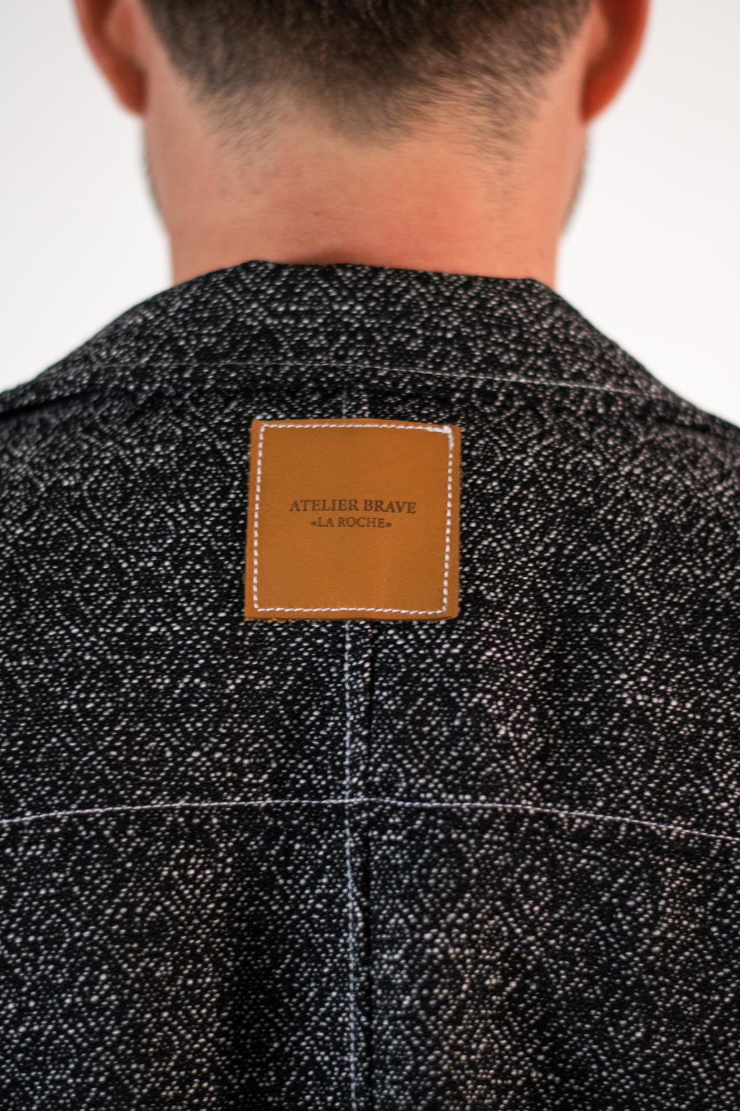 Veste jacquard noire texturée