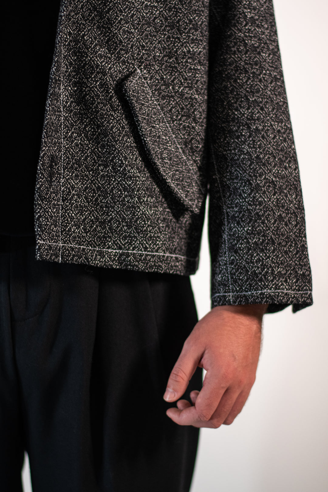 Veste jacquard noire texturée