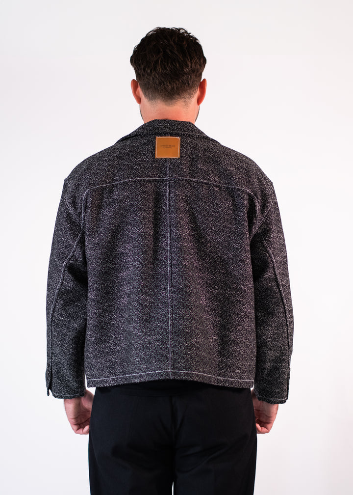 Veste jacquard noire texturée