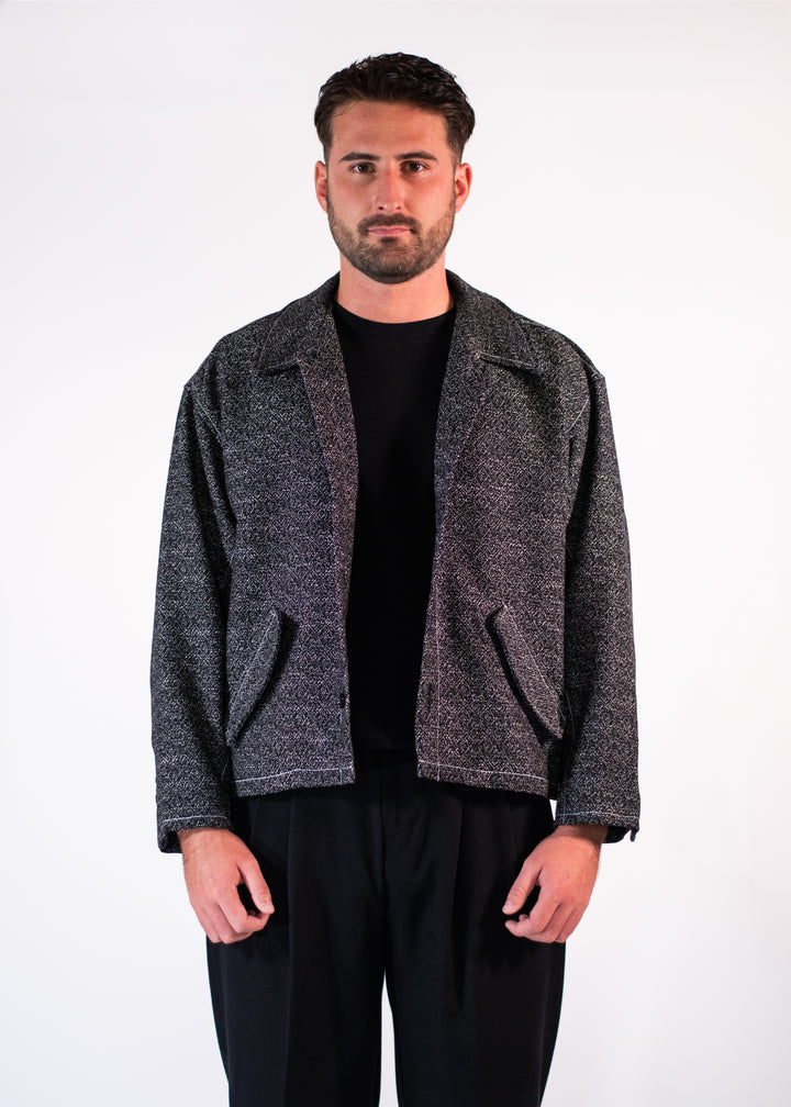 Veste jacquard noire texturée